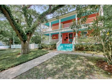 Charming two-story home with wrap-around porch and landscaped yard at 113 Meeting St., Georgetown, SC 29440