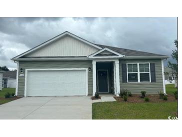 Charming single-story home featuring a two-car garage and well-maintained landscaping at 1480 Nokota Dr., Conway, SC 29526