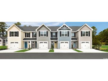 Four townhouses with attached garages and attractive landscaping at 3014 Nw Edgemead Circle # F, Calabash, NC 28467