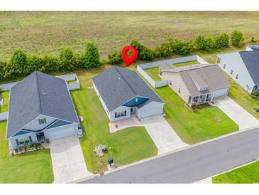 Aerial view of a house and surrounding neighborhood at 352 High Falls Dr., Conway, SC 29526