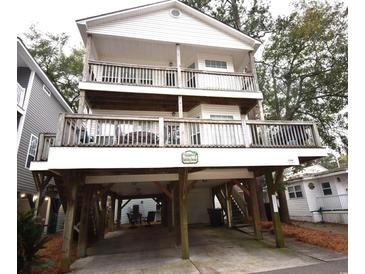 Two-story house with large deck and parking underneath at 6001-1709 South Kings Hwy., Myrtle Beach, SC 29575