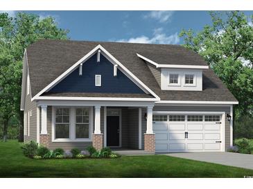 Two-story home with gray siding, navy accents, and brick detailing at 2163 Gooseberry Way, Longs, SC 29568