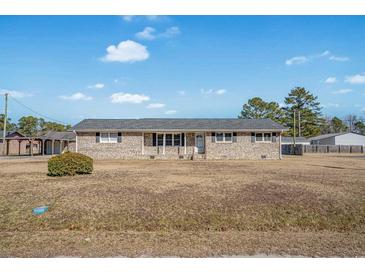 Brick ranch house with a spacious yard at 4637 Dogwood St., Loris, SC 29569