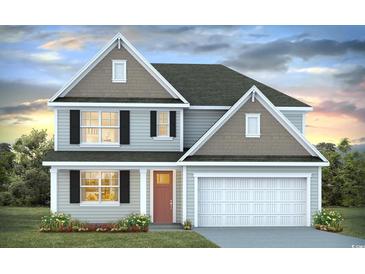 Two-story home with gray siding, white trim, and a two-car garage at 554 Haven View Way, Murrells Inlet, SC 29576