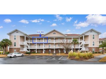 Exterior view of a two-story condo building, unit 932 highlighted at 5750 Oyster Catcher Dr. # 932, North Myrtle Beach, SC 29582