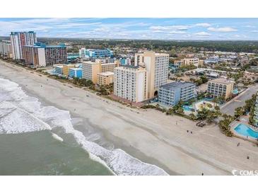 Aerial view of beachfront property, showing ocean, beach, and high-rise buildings at 1205 S Ocean Blvd. # 50412, Myrtle Beach, SC 29577