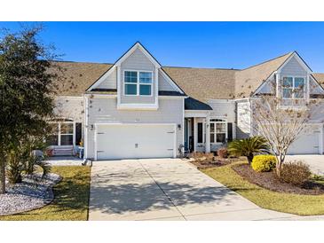 Attractive 2-story home with gray siding, landscaping, and a 2-car garage at 5522 Elba Way # 5522, Myrtle Beach, SC 29579