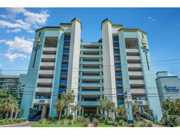 Oceanfront building exterior, featuring parking and two towers at 6804 N Ocean Blvd. # 1117, Myrtle Beach, SC 29572