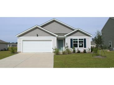 Charming one-story house with gray siding, white garage door, and landscaped lawn at 3410 Ashridge Way, Conway, SC 29526