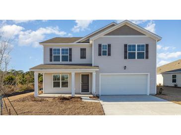 Two-story house with gray siding, a two-car garage, and a covered porch at 3433 Ashridge Way, Conway, SC 29526