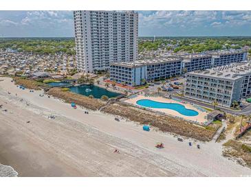 Aerial view of coastal community, pool, and beach access at 5905 S Kings Hwy. # 514-B, Myrtle Beach, SC 29575