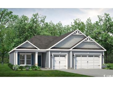 Gray exterior of charming ranch-style home with three-car garage at 804 Big Cedar Dr., Loris, SC 29569