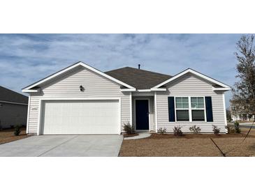 Charming one-story home showcasing a white garage door, blue shutters, and light gray vinyl siding at 6000 Fuller Ridge Ct, Conway, SC 29526