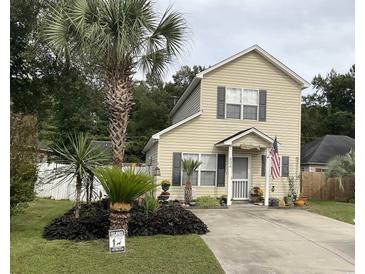 Charming two-story house with landscaped yard and walkway at 804 Brenda Pl., Myrtle Beach, SC 29577