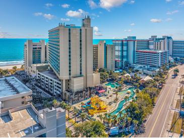 Overhead view of Sand Dunes Resort with pools, waterpark, ocean views and beach access at 201 74Th Ave. N # 2640, Myrtle Beach, SC 29572
