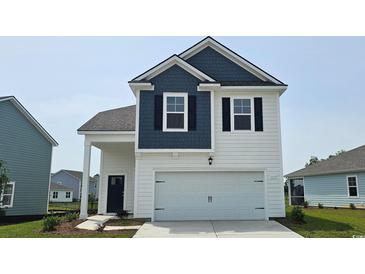 Charming two-story home featuring a clean white garage door and complementary blue accents at 1119 Black Lake Way, Conway, SC 29526