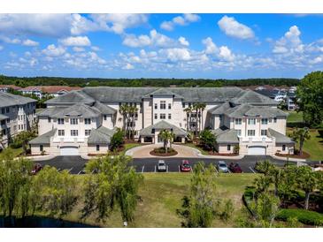 Aerial view of a luxurious condo community with a golf course at 2180 Waterview Dr. # 812, North Myrtle Beach, SC 29582