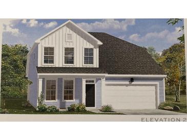 Two-story house with light blue siding, white accents, and a two-car garage at 243 Letha Dr, Longs, SC 29568