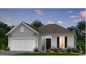 One-story house with gray siding, white garage doors, and landscaping at 2604 Watershed Way, North Myrtle Beach, SC 29568