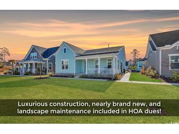 Brand new home with light blue exterior and a front porch at 130 Black Water Dr., Murrells Inlet, SC 29576