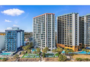 Stunning aerial view of resort buildings, pools, and beautiful landscaping at 2700 N Ocean Blvd. # 253, Myrtle Beach, SC 29577