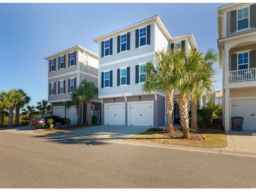 Charming three-story beach home featuring a two-car garage and beautiful palm trees at 4904 Salt Creek Ct., North Myrtle Beach, SC 29582