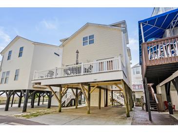 Charming beach house on stilts with covered parking and a spacious deck, perfect for coastal living at 6001- 1084 S Kings Highway, Myrtle Beach, SC 29575