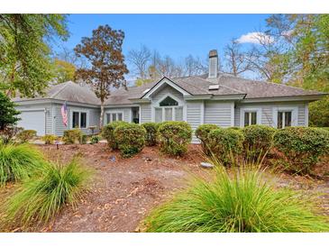 Charming single-story home with manicured landscaping and a welcoming front yard at 4956 Dory Ct., North Myrtle Beach, SC 29582