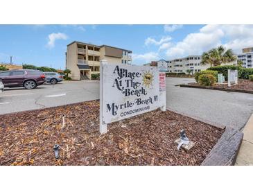 Charming condo complex sign inviting guests to enjoy a relaxing vacation at the beach at 9620 Shore Dr. # C101, Myrtle Beach, SC 29572
