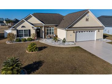 Charming single-Gathering home with a well-manicured lawn and inviting curb appeal at 302 Camrose Way, Myrtle Beach, SC 29588