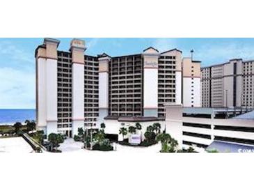 Beautiful condo exterior showing the building and landscaping at 4800 S Ocean Blvd. # 1514, North Myrtle Beach, SC 29582