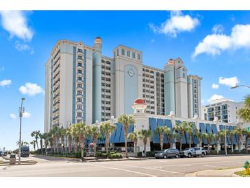 Stunning exterior view of the building complex, showcasing the beautiful architecture and surrounding palm trees at 2311 S Ocean Blvd. # 969, Myrtle Beach, SC 29577