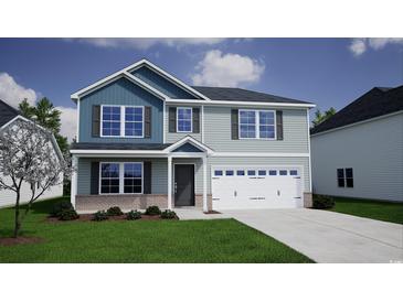 Charming two-story home with a classic design, a two-car garage and manicured lawn at 679 Mccorkle Place, Conway, SC 29526