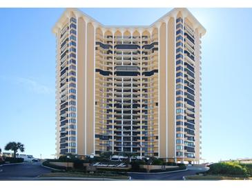 Stunning exterior shot of the beachfront high-rise condo community with well-manicured landscaping at 9650 Shore Dr. # 503, Myrtle Beach, SC 29572