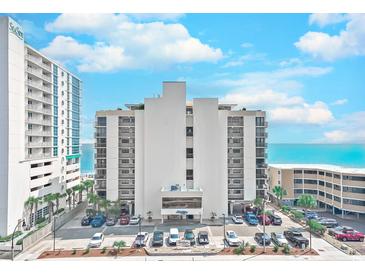 Wide shot of the oceanfront condo building with easy access to the beach and on-site parking at 2307 S Ocean Blvd. # 5A, North Myrtle Beach, SC 29582