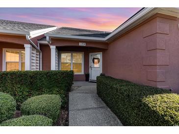 Inviting entryway with a charming walkway and well-maintained landscaping at 4535 Lightkeepers Dr. # 27B, Little River, SC 29566