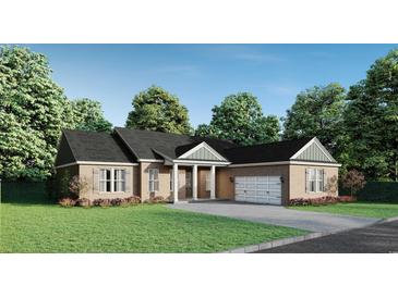 Charming single-story home with a well-manicured lawn and attached two-car garage at 885 Bear Lake Dr., Longs, SC 29568