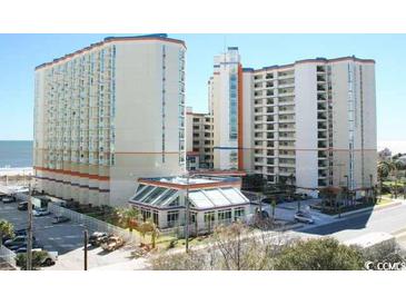 Oceanfront condo building with beach access, parking, and a blue accent over the upper exterior at 5200 N Ocean Blvd. # 151, Myrtle Beach, SC 29577