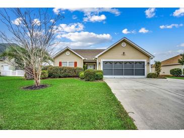 Charming single-story home with well-manicured lawn and mature landscaping at 645 Twinflower St., Little River, SC 29566