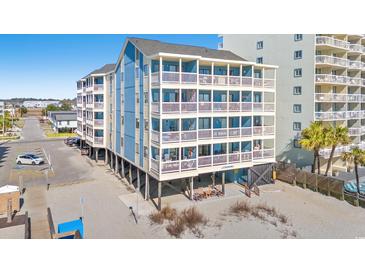 Beautiful multifamily condo with private balconies and beach access, featuring an elevator for easy access and plenty of parking at 1000 N Waccamaw Dr. # 205, Murrells Inlet, SC 29576