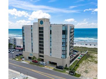 Oceanfront condo building featuring a central location and beach access at 1425 S Ocean Blvd. # 8-B, North Myrtle Beach, SC 29582