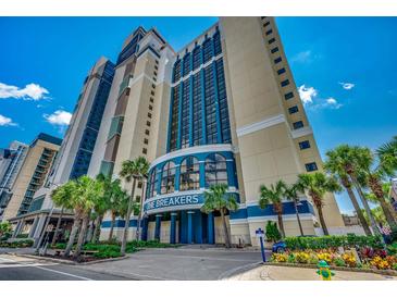 Beautiful exterior of The Breakers resort with well-maintained landscaping and clear blue sky at 2006 N Ocean Blvd. # 876, Myrtle Beach, SC 29577