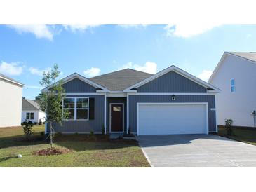 Charming single-story home featuring a gray exterior, attached garage, and well-maintained landscaping at 438 Acosta Circle, Conway, SC 29527