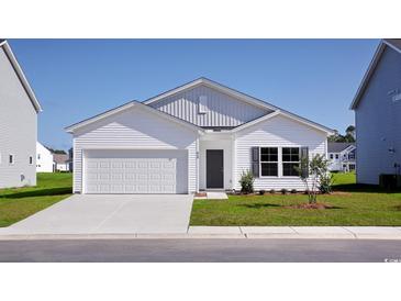 Charming single-Gathering home with a two-car garage and a well-maintained lawn on a sunny day at 620 Mccorkle Place, Conway, SC 29526