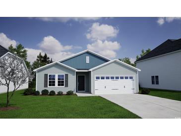 Charming single-story home with blue and gray siding, a well-manicured lawn, and an attached two-car garage at 620 Mccorkle Place, Conway, SC 29526