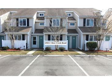 Charming townhome with individual entrances and designated parking spaces at 1500 Deer Creek Rd. # C, Surfside Beach, SC 29575