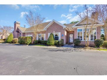 Well-maintained brick building with manicured landscaping and ample parking at 2019 Balfour Ct. # L4, Myrtle Beach, SC 29575