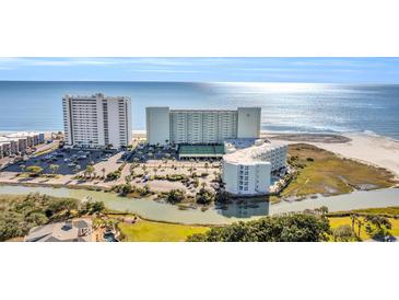 Beautiful coastal condo community with ocean views, pools, tennis courts, parking, and nearby waterway at 9400 Shore Dr. # 722, Myrtle Beach, SC 29572
