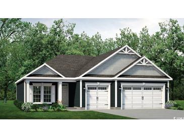 Charming home with a two-car garage, well-maintained lawn, and stylish architectural details at 147 Little Cedar Dr., Loris, SC 29569