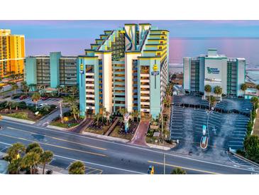 Bright, tiered beachfront resort condo complex with ocean views and prominent signage at 6804 N Ocean Blvd. # 631, Myrtle Beach, SC 29572